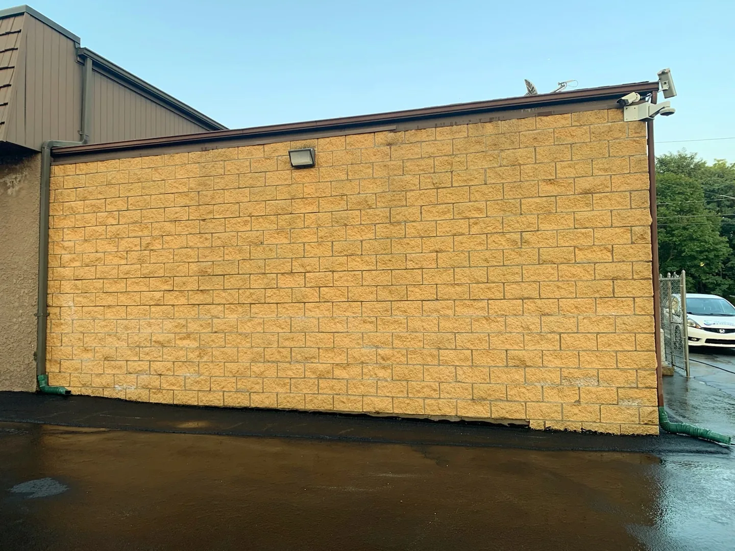 The same exterior block wall after cleaning